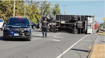  ?? H John Voorhees III / Hearst Connecticu­t Media file photo ?? An overturned box truck was involved in a multi-vehicle accident on Route 7 in New Milford on Oct. 20, 2021.