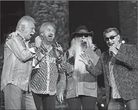  ??  ?? The Oak Ridge Boys — (from left) Joe Bonsall, Duane Allen, William Lee Golden and Richard Sterban — perform Monday at Harding University in Searcy.