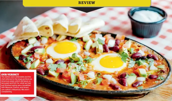  ??  ?? Huevos Rancheros:Eggs with avocado, Pico de Gallo, beans and some spicy tomatoes are served with flour tortilla