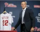  ?? MATT ROURKE — THE ASSOCIATED PRESS ?? New Phillies manager Gabe Kapler walks onto the stage for a news conference Thursday in Philadelph­ia.