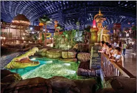  ??  ?? IMG Worlds of Adventure, world’s largest indoor theme park; (right) The Dubai Mall, world’s largest shopping mall.