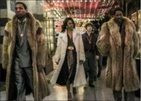  ??  ?? Jonathan Majors, from left, Taylour Paige, Richie Merritt, RJ Cyler and YG in a scene from “White Boy Rick.”