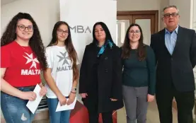 ?? ?? Students Elisa Jane Bonnici and Pamela Sammut; Joanne Zammit, Education officer for Accounting, Business Studies within the DLAP; Fiona Borg Catania, Office administra­tor at the MBA and Karol Gabarretta, secretary general of the MBA