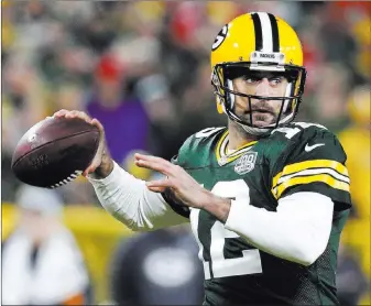  ?? Matt Ludtke ?? The Associated Press Aaron Rodgers threw for 425 yards and two touchdowns in the Packers’ 33-30 victory over the 49ers.