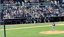  ?? FILE PHOTO ?? Prairie Grove 2014 graduate Ty Tice prepares his next pitch on the mound during the seventh inning of a spring training game between the visiting Toronto Blue Jays at New York Yankees at George M. Steinbrenn­er Field in Tampa, Fla. Tice made his Major League debut on April 9 with the Blue Jays against the Angels. On Friday, June 4, he was traded to the Braves and optioned to Gwinnett, the franchise’s local Triple A affiliate in suburban Atlanta.