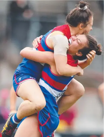  ??  ?? CHANGING DYNAMICS: Ellie Blackburn (right) said she’ll miss her mate, Emma Kearney, who has joined North Melbourne, but is confident the Bulldogs can cover her absence. Picture: AFL MEDIA/GETTY