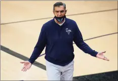  ?? Matt Slocum / Associated Press ?? Villanova coach Jay Wright announced on Sunday that he and a member of his staff have tested positive for COVID-19.