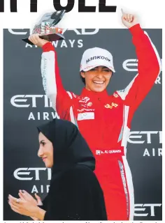  ?? Victor Besa / The National ?? Amna Al Qubaisi erupts in tears of joy after winning the Formula 4 race’s non-Championsh­ip trophy