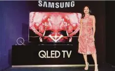  ??  ?? Siri QLED TV yang diperkenal­kan Samsung paling canggih di pasaran.
