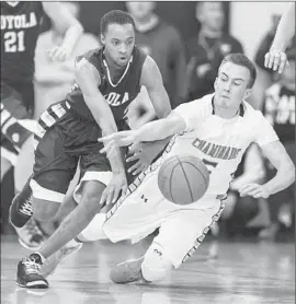  ?? Bret Hartman
For The Times ?? LOYOLA POINT GUARD Parker Jackson-Cartwright, left, and Chaminade’s Max Tinsley go after a loose ball during Loyola’s victory.