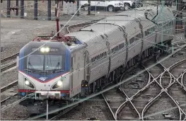  ?? MATT ROURKE — THE ASSOCIATED PRESS ?? An Amtrak train departs 30th Street Station in Philadelph­ia on Wednesday.