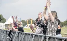  ??  ?? Pictured are festival-goers. Image courtesy of On Track Media UK.