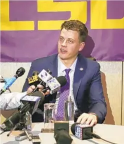  ?? GETTY ?? Joe Burrow, winner of Heisman Memorial Trophy, speaks with reporters on Saturday night in New York.