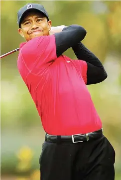  ??  ?? File photo: Tiger Woods hits his tee shot during a past tournament