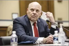  ?? AP photo ?? United States Postal Service Postmaster General Louis DeJoy looks on during a House Oversight and Reform Committee hearing on “Legislativ­e Proposals to Put the Postal Service on Sustainabl­e Financial Footing” on Capitol Hill on Wednesday in Washington.