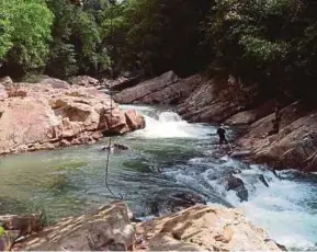  ??  ?? The Lubuk Yu waterfall in Maran was closed for three months after eight people succumbed to leptospiro­sis in 2010.