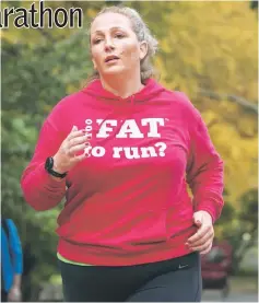  ??  ?? Julie Creffield, from London, runs in Central Park on Nov 2 in New York. — AFP photo