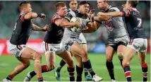  ?? GETTY IMAGES ?? Jason Taumalolo charges through the Roosters defence last night.