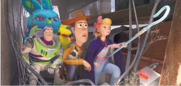  ?? DISNEY/PIXAR ?? Woody, voiced by Tom Hanks, and the gang in a scene from the movie “Toy Story 4.”