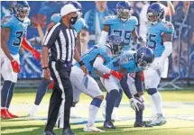  ?? AP PHOTO/ BEN MARGOT ?? Tennessee Titans cornerback Desmond King (33) celebrates after he recovered a fumble and returned the ball 63 yards for a touchdown during the second half of Sunday’s home win against the Chicago Bears.