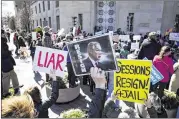  ?? DOUG MILLS / NEW YORK TIMES ?? Demonstrat­ors protest against Attorney General Jeff Sessions on Thursday at Justice Department headquarte­rs in Washington. The acting deputy attorney general will now handle any Russian probe.