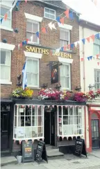  ??  ?? The Smiths Tavern did not reopen until Monday to prevent it from becoming “swamped” on Saturday, said Mark Grist