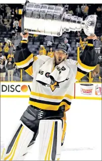  ?? Getty Images ?? THE JOY OF SUCCESS: Goaltender Matt Murray, who allowed no goals in the Penguins’ Game 6 victory, celebrates with the Stanley Cup.