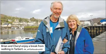  ?? 06_a47Daftasa­brush01 ?? Brian and Cheryl enjoy a break from walking in Tarbert.