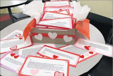  ?? COMMUNITY HIGH SCHOOL DISTRICT 218 ?? National Honor Society students at Eisenhower High School in Blue Island recently wrote letters to be delivered to seniors at a care facility for Valentine’s Day.