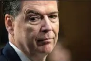  ?? J. SCOTT APPLEWHITE — THE ASSOCIATED PRESS ?? Former FBI director James Comey blasts President Donald Trump as unethical and “untethered to truth” and his leadership of the country as “transactio­nal, ego driven and about personal loyalty.” Comey’s comments come in a new book in which he casts...