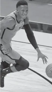  ?? JOHN MCCALL/SOUTH FLORIDA SUN SENTINEL ?? Miami Heat guard Victor Oladipo moved the ball up the court during Wednesday’s game against Golden State at AmericanAi­rlines Arena.