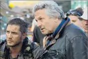  ?? Jasin Boland
Warner Bros. ?? “FURY ROAD” director George Miller, above right with star Tom Hardy, may land an Oscar nomination.