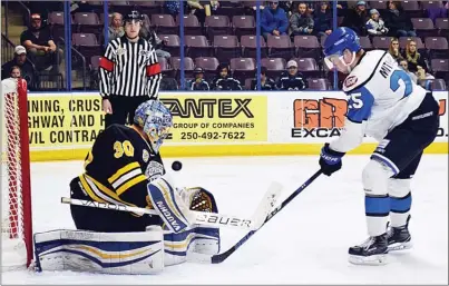  ?? DAVID CROMPTON/The Okanagan Weekend ?? Penticton Vees forward Marcus Mitchell has his deflection stopped by Coquitlam Express goalie Brock Hamm during BCHL playoff action at the South Okanagan Events Centre in Penticton on Friday night. The Vees won 2-1.