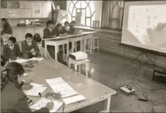  ?? HINDUSTAN TIMES ?? Students at a Delhi school learn calligraph­y through teleconfer­ence. Expect a push around skill developmen­t in the government’s new National Policy on Education