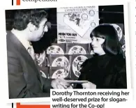  ??  ?? Dorothy Thornton receiving her well-deserved prize for sloganwrit­ing for the Co-op!