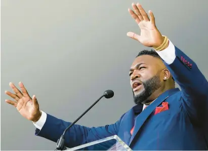  ?? JOHN MINCHILLO/AP ?? Baseball Hall of Fame inductee David Ortiz, formerly of the Boston Red Sox, speaks during the induction ceremony Sunday in Cooperstow­n, New York.