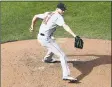  ?? Rob Carr / Getty Images ?? Chris Sale delivers a pitch against the Orioles on Saturday.