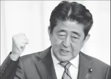  ??  ?? Japan’s Prime Minister Shinzo Abe, above, is adamant that the 2020 Olympic Games in Tokyo will go ahead as planned.