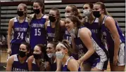  ?? DAN FENNER — FOR MEDIANEWS GROUP ?? Lakeland celebrated its first girls basketball district title since 2015after defeating Walled Lake Northern 52-34 on Friday.