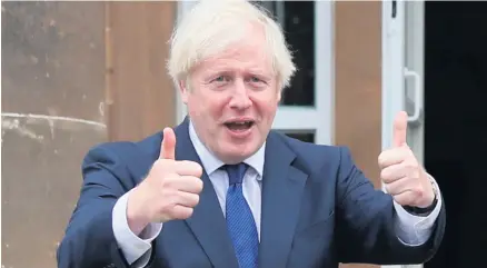  ?? PA ?? Thumbs up: Boris Johnson at Hillsborou­gh Castle during his visit to Northern Ireland last August when he announced the Centenary Forum