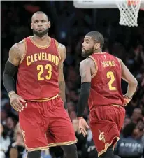  ?? AP Photo/Jae C. Hong ?? Cleveland Cavaliers' LeBron James, left, greets Kyrie Irving March 19 during the second half of a game against the Los Angeles Lakers in Los Angeles. There is bad blood once again in the NBA, and it's more individual­ly driven—thanks in large part to...