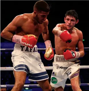  ?? Photos: LAWRENCE LUSTIG/MATCHROOM ?? UNDERCARD HIGHLIGHTS: Mcdonnell finishes strongly to take Yafai’s unbeaten record [above]; A bad cut stymies Allen in his Commonweal­th title rematch against Thomas [above right]; And Galahad [right] produces a spectacula­r finish against Berry