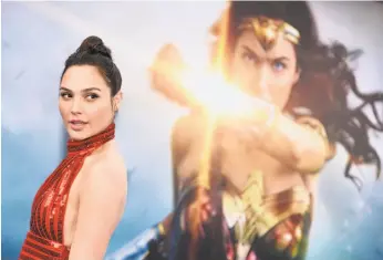  ?? Jordan Strauss / Invision ?? Actress Gal Gadot attends May’s premiere of “Wonder Woman” in Los Angeles.