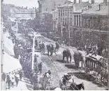  ?? EDWIN POOLE COURTESY OF STEVE MOUCK ?? It was not every day you saw elephants walking down St. Paul
Street, so photograph­er Edwin Poole grabbed his camera, pointed it out his window, and took this shot. The year is unknown.