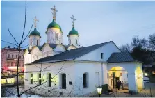  ?? PHOTOS: ALEXANDER ZEMLIANICH­ENKO/THE ASSOCIATED PRESS ?? The Russian Orthodox Church known as St. Trinity in the Leaves, which was built in Moscow in 1651, was fully restored in the 1990s.