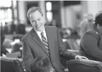  ?? Associated Press file photo ?? Texas Speaker of the House Joe Straus, R-San Antonio, talks with fellow lawmakers April 19 on the House floor at the Capitol in Austin. Straus says he doesn’t want a “suicide” on his hands over a so-called bathroom bill that Gov. Greg Abbott is...