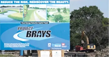  ?? Associated Press photos ?? ■ Left and below left, constructi­on workers help excavate and widen Brays Bayou on Thursday in Houston as part of a nearly $500 million flood-control project. The project, which will widen 21 miles of the bayou and build stormwater detention basins,...