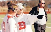  ?? PATRICK RAYCRAFT/HARTFORD COURANT ?? Cathy and John McGuirk coaching Branford High field hockey in 2004.