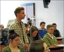  ?? SUBMITTED PHOTO ?? Downingtow­n West High School senior Noah Haggerty asks a question about gun violence and suicide prevention.