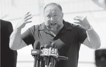  ?? JOE BUGLEWICZ TNS ?? InfoWars founder Alex Jones remains defiant, even after several court decisions against him awarded the families of the Sandy Hook school-shooting victims nearly $1.5 billion in damages.